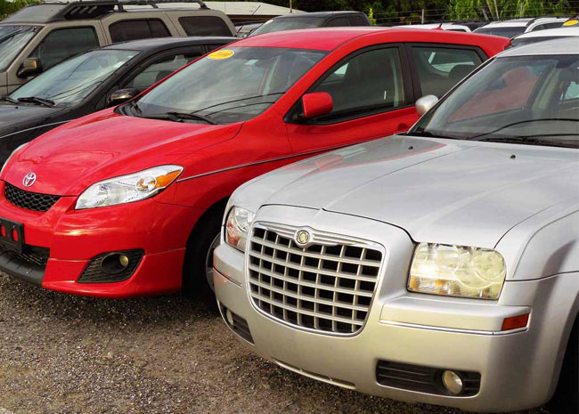 Cars neatly arranged in a parking area, featuring cash for unwanted cars in Brisbane.